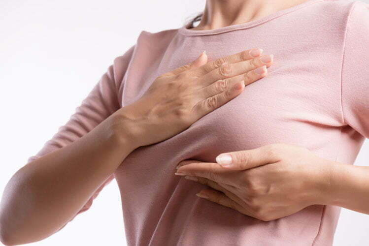 woman-checking-lumps-on-breast-for-signs-of-cancer-beacpn-hospital-malaysia